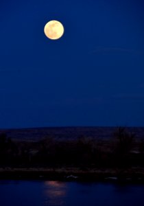 Pink moon rising over the Green River at Seedskadee National Wildlife Refuge