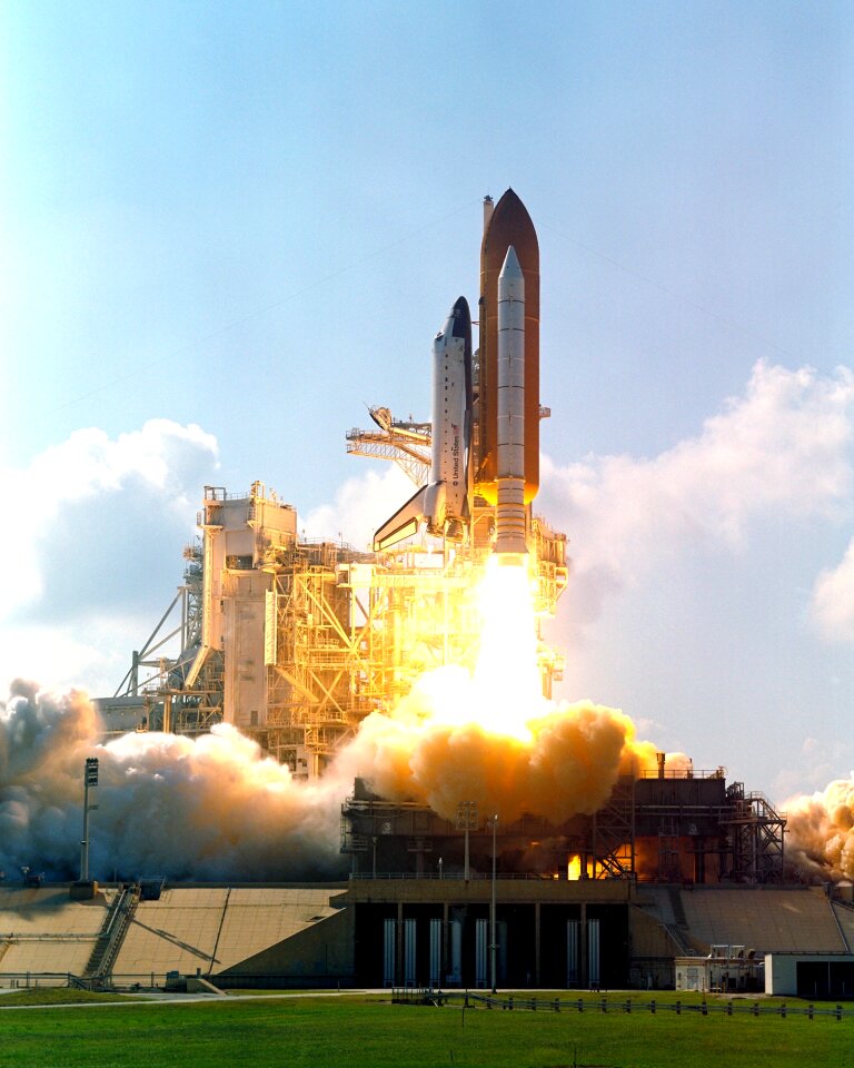 Astronauts liftoff rockets