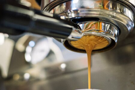 Brewing fresh espresso