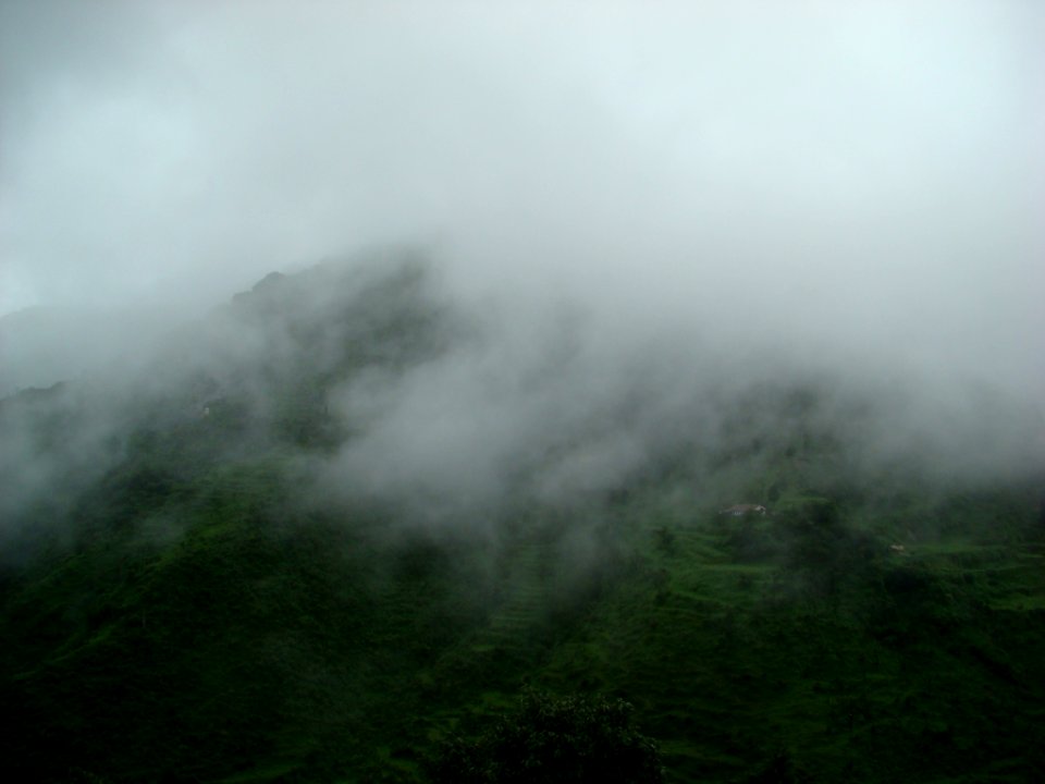 Clouds covering the hills