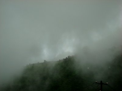 Clouds covering the hills photo