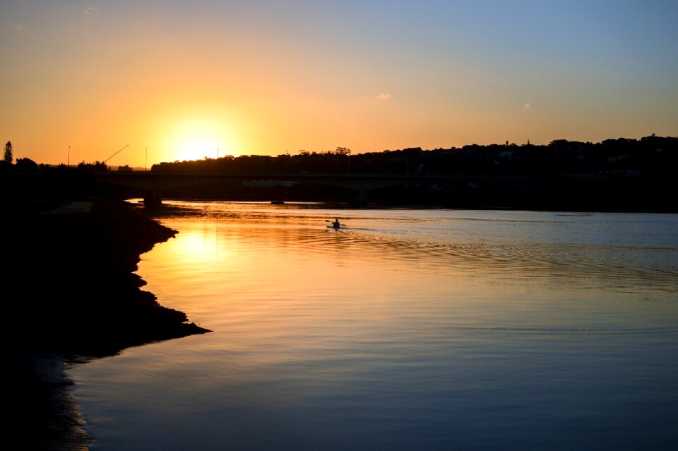 Kayak paddling sunset