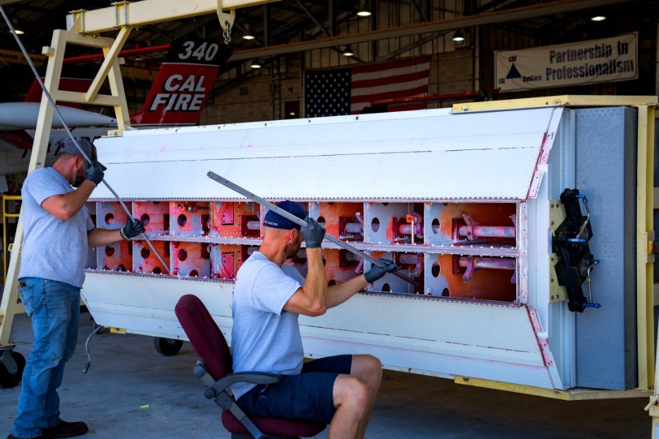 Cal Fire crew scrubs tank
