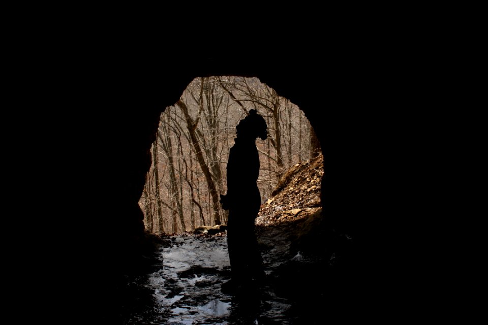 Surveying ceiling cracks for bats in an Indiana Cave 3-13-09