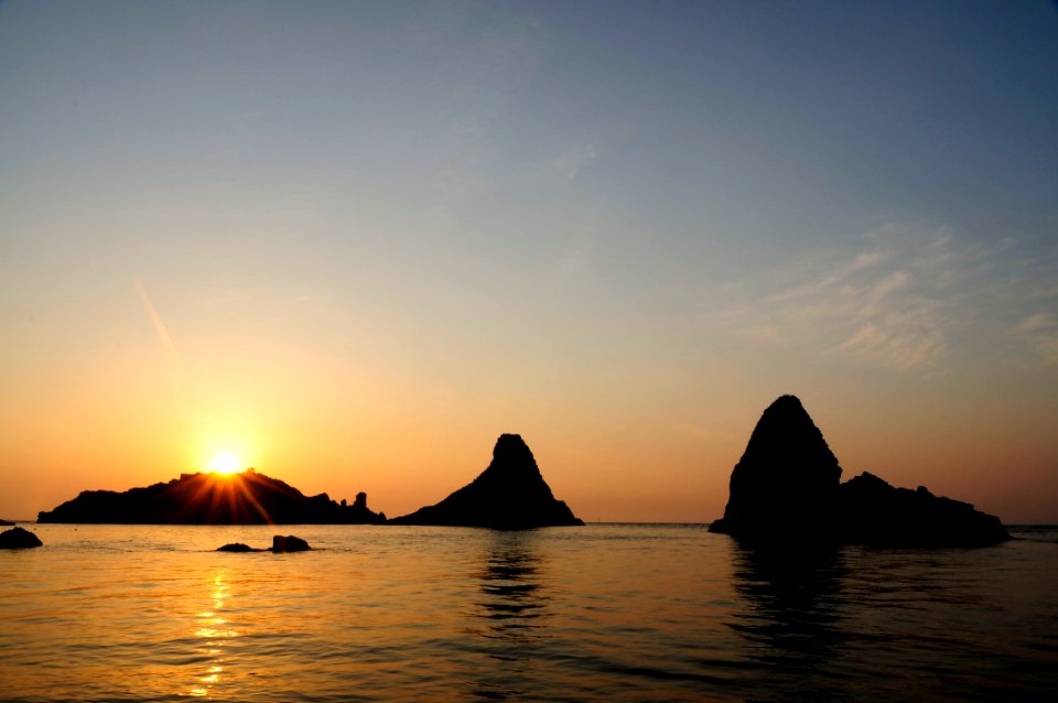Islands of the Cyclops at Dawn Sicily Italy - Creative Commons by gnuckx
