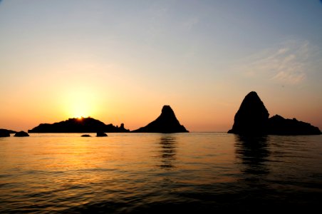 Islands of the Cyclops at Dawn Sicily Italy - Creative Commons by gnuckx