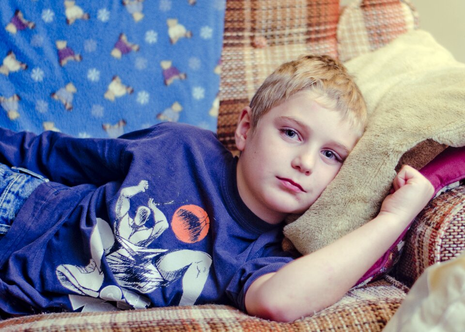 Laying down couch child