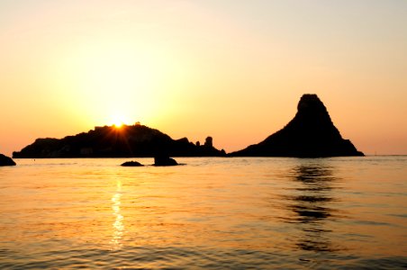 Islands of the Cyclops at Dawn Sicily Italy - Creative Commons by gnuckx
