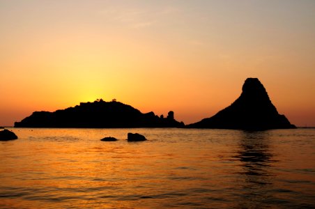 Islands of the Cyclops at Dawn Sicily Italy - Creative Commons by gnuckx