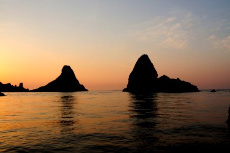 Islands of the Cyclops at Dawn Sicily Italy - Creative Commons by gnuckx