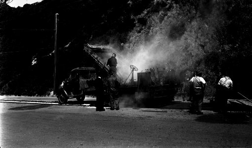 456; Upper Bowen Street, workmen sealing road surface - Circa 1940