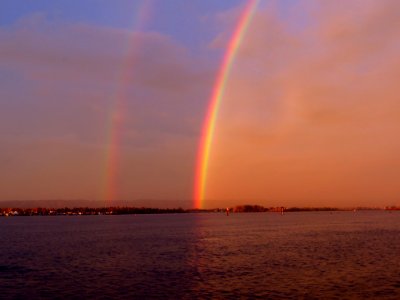 Full Rainbow at Sunrise at Columbia River in Washington photo