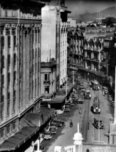 79; Lambton Quay looking south, with the DIC department store on the left between Brandon Street and Panama Street. - 1930