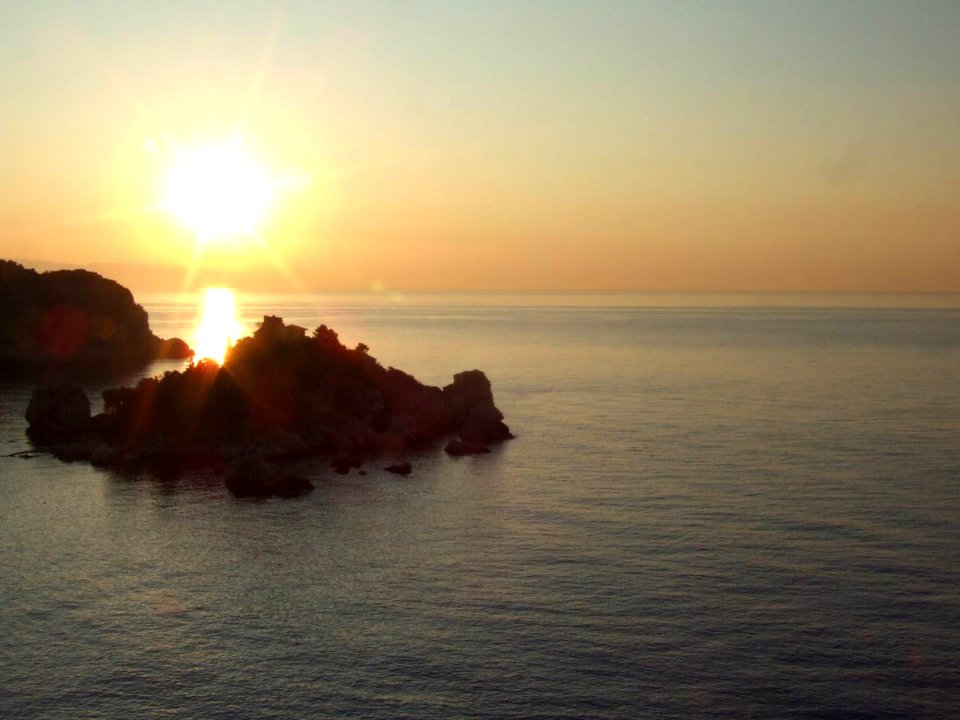 Dawn Sunset Isola Bella Taormina Sicilia Italy - Creative Commons by gnuckx