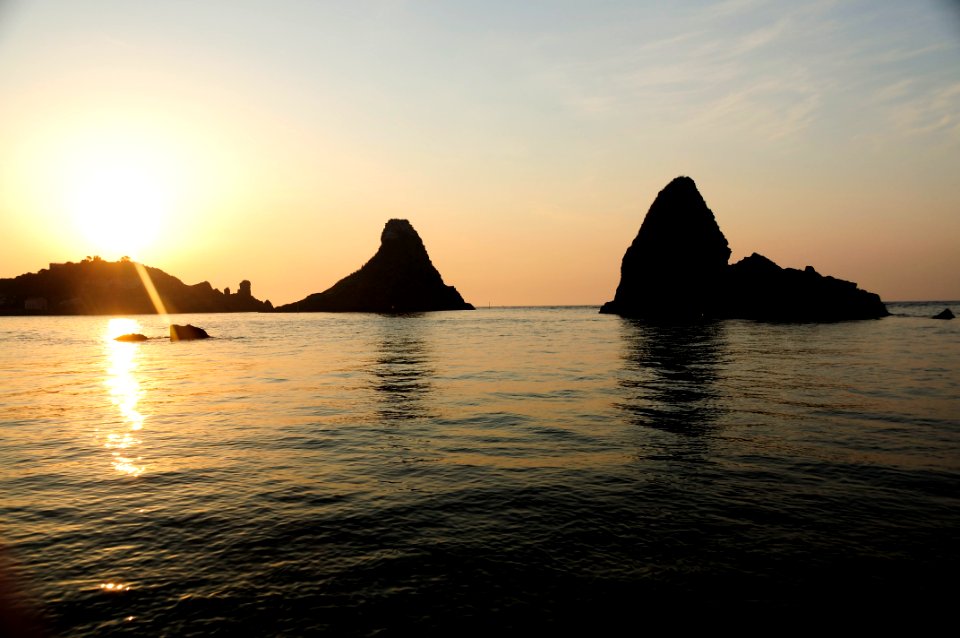 Islands of the Cyclops at Dawn Sicily Italy - Creative Commons by gnuckx