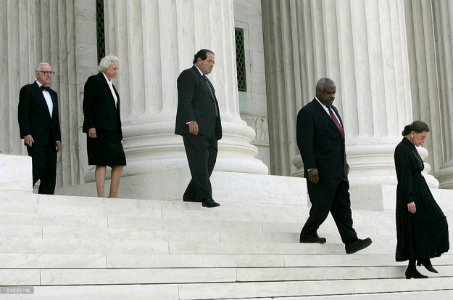John Paul Stevens, Sandra Day O'Connor, Anthony Scalia, Clarence Thomas, and Ruth Bader Ginsburg walk down the Stairs of the Supreme Court to greet the coffin of Chief Justice William Rehnquist, September 6, 2005