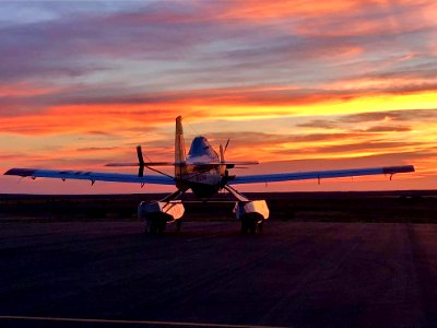 A Fire Boss Water Scooper parked at Sunset. Photo courtesy of Ted Thompson, Mountain Home Aviation.