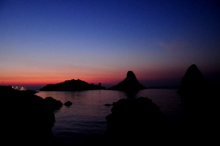 Islands of the Cyclops at Dawn Sicily Italy - Creative Commons by gnuckx
