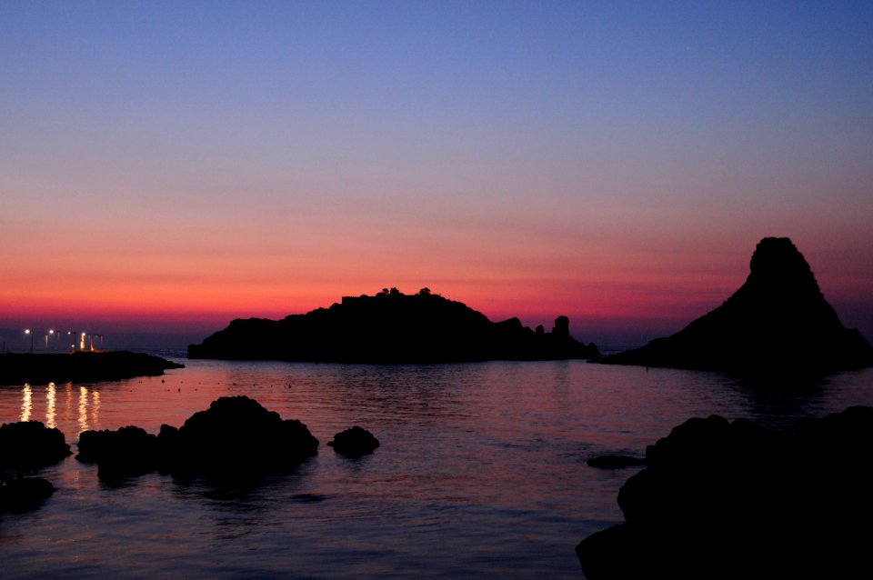 Islands of the Cyclops at Dawn Sicily Italy - Creative Commons by gnuckx