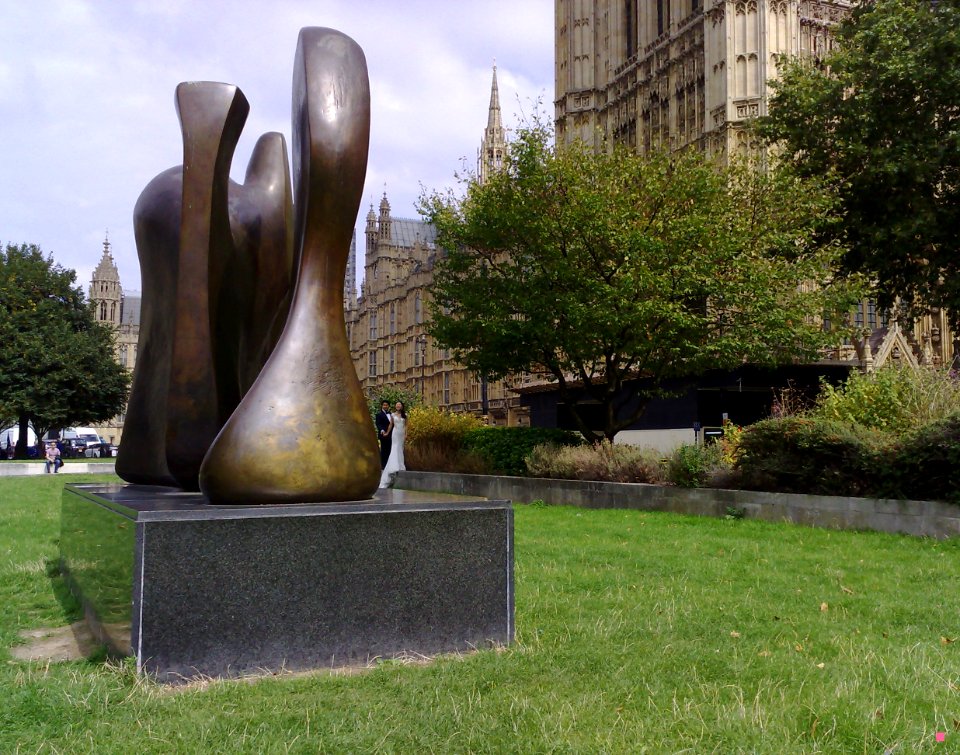 A COUPLE GETTING MARRIED BY THE HENRY MOORE SCULPTURE - HOUSES OF PARLIAMENT - WEDDING