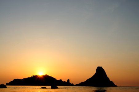 Islands of the Cyclops at Dawn Sicily Italy - Creative Commons by gnuckx