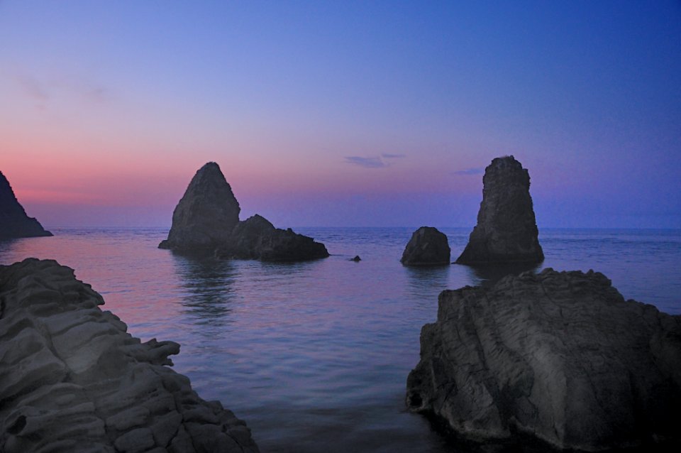 Islands of the Cyclops at Dawn Sicily Italy - Creative Commons by gnuckx