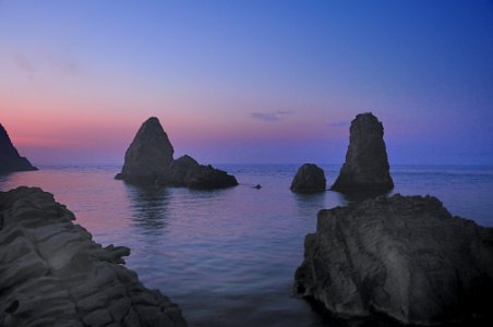 Islands of the Cyclops at Dawn Sicily Italy - Creative Commons by gnuckx
