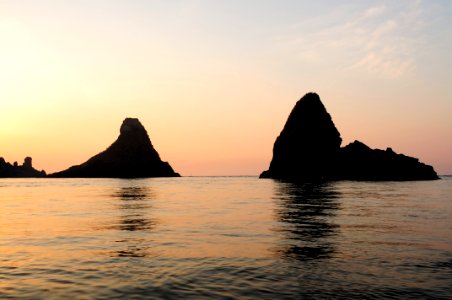 Islands of the Cyclops at Dawn Sicily Italy - Creative Commons by gnuckx