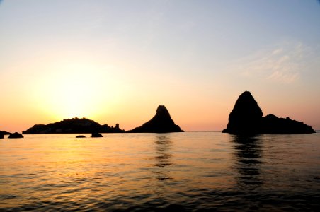 Islands of the Cyclops at Dawn Sicily Italy - Creative Commons by gnuckx