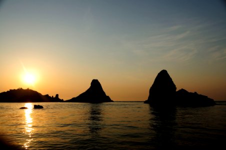 Islands of the Cyclops at Dawn Sicily Italy - Creative Commons by gnuckx