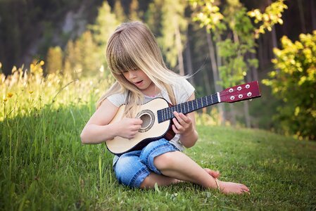 Girl blond guitar photo