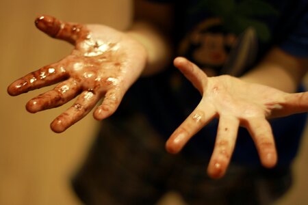 Dirty hands chocolate parenting photo