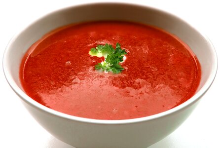 Tomato soup cook bowl photo