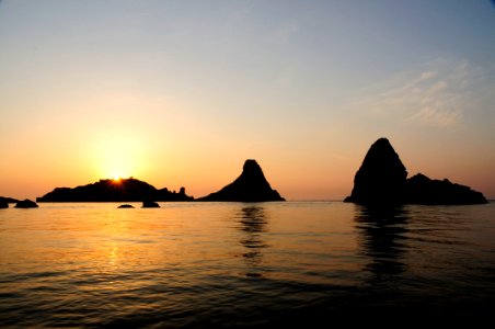 Islands of the Cyclops at Dawn Sicily Italy - Creative Commons by gnuckx