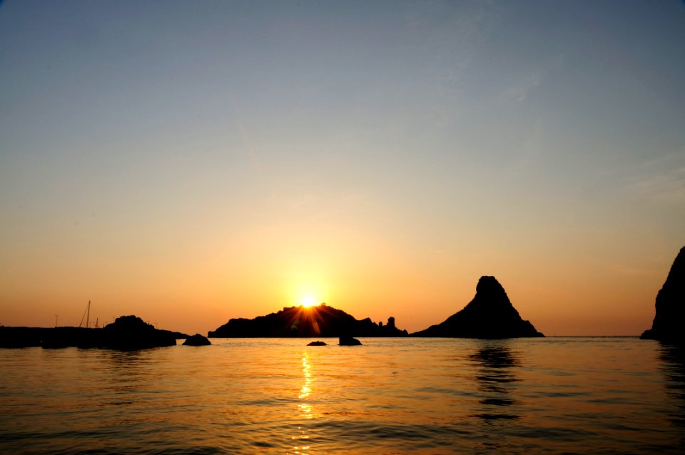 Islands of the Cyclops at Dawn Sicily Italy - Creative Commons by gnuckx
