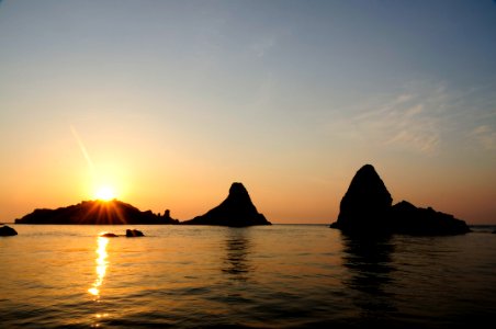 Islands of the Cyclops at Dawn Sicily Italy - Creative Commons by gnuckx