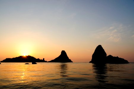 Islands of the Cyclops at Dawn Sicily Italy - Creative Commons by gnuckx