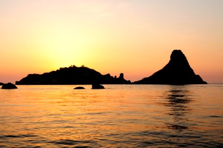 Islands of the Cyclops at Dawn Sicily Italy - Creative Commons by gnuckx