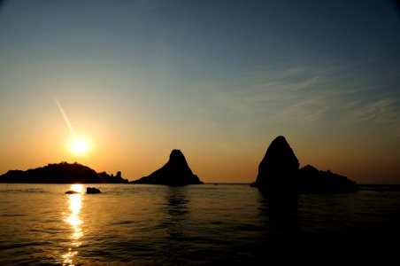 Islands of the Cyclops at Dawn Sicily Italy - Creative Commons by gnuckx