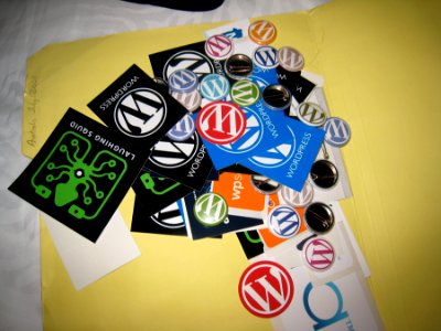 WordPress Swag- got my collction of pins, stickers, and mre