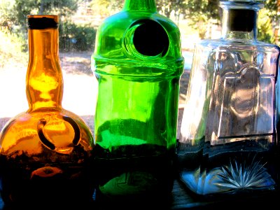 Three Colored Bottles Wish They Could Play Outside