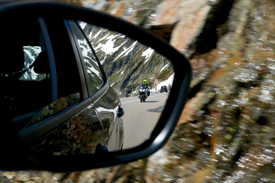 Tracker motorcyclist alpine road