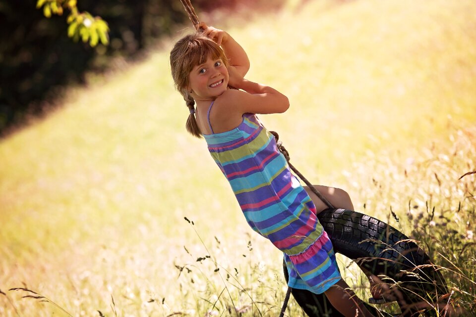Girl rock tire swing