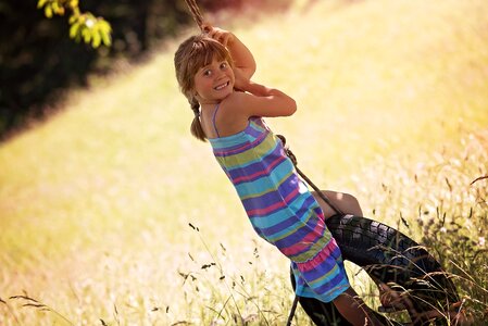 Girl rock tire swing