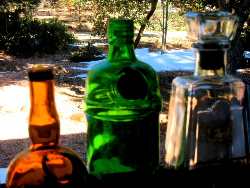 Three Bottles Looking Whistfully Out the Window