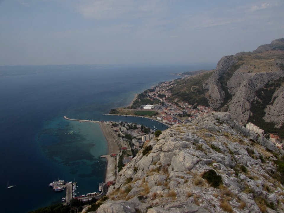 Omis town and mouth of Cetina river into Adriatic Sea