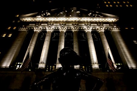 Fearless Girl and New York Stock Exchange at Night