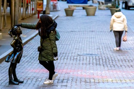 Fearless Girl and woman photo