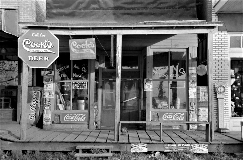 Call for Beer: Storefront in Altheimer, Arkansas, October 1938.