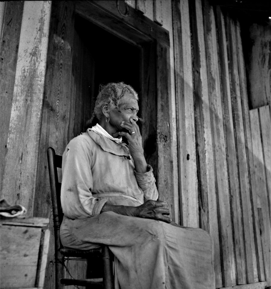 So Long the Road: Portrait of an elderly cotton sharecropper in Mississippi, June 1937. She was born 'two years before the surrender' (In 1863, two years before the end of the Civil War).
